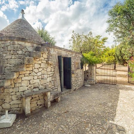 Trulli Girasoli E Viole Cocolicchio Bagian luar foto