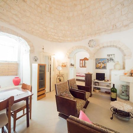 Trulli Girasoli E Viole Cocolicchio Ruang foto