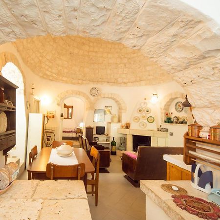 Trulli Girasoli E Viole Cocolicchio Ruang foto