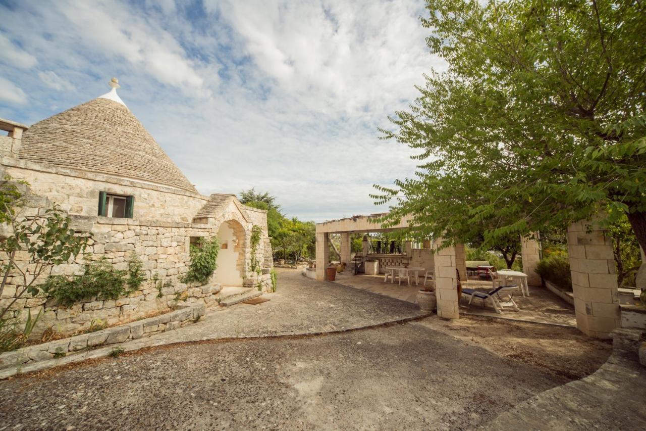 Trulli Girasoli E Viole Cocolicchio Bagian luar foto