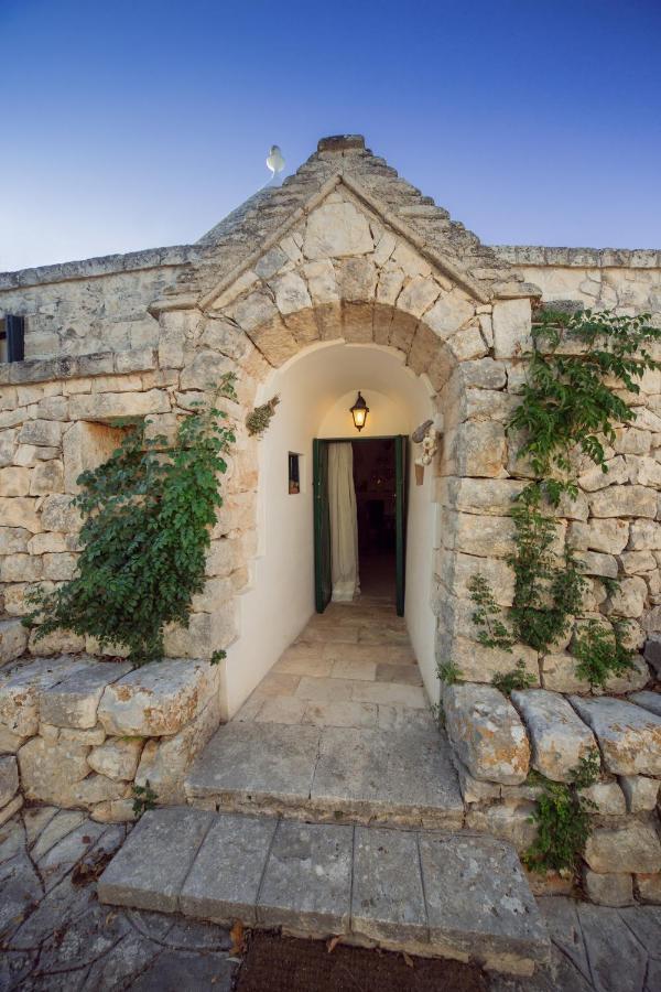 Trulli Girasoli E Viole Cocolicchio Bagian luar foto