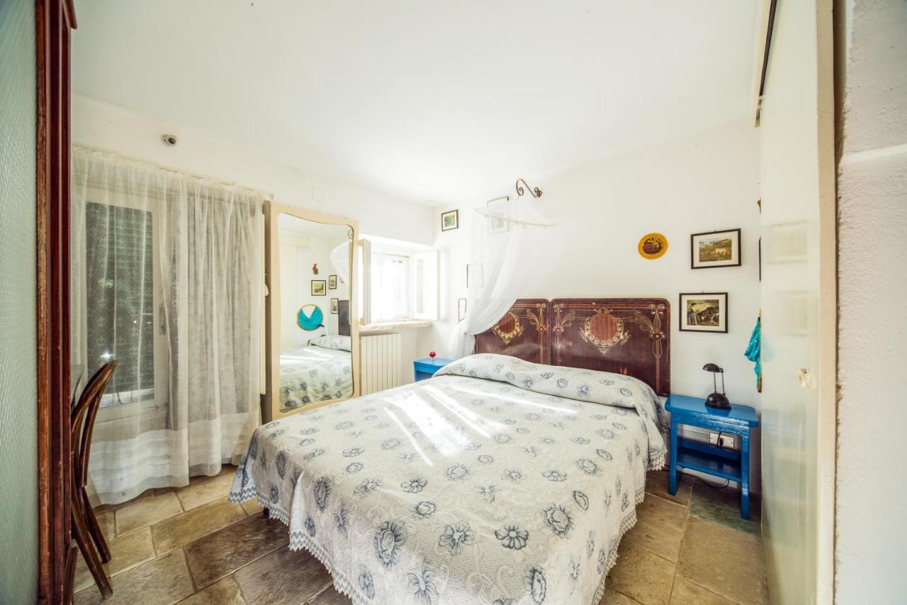 Trulli Girasoli E Viole Cocolicchio Bagian luar foto