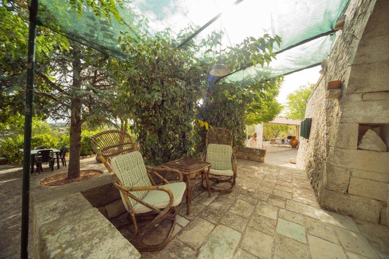 Trulli Girasoli E Viole Cocolicchio Bagian luar foto