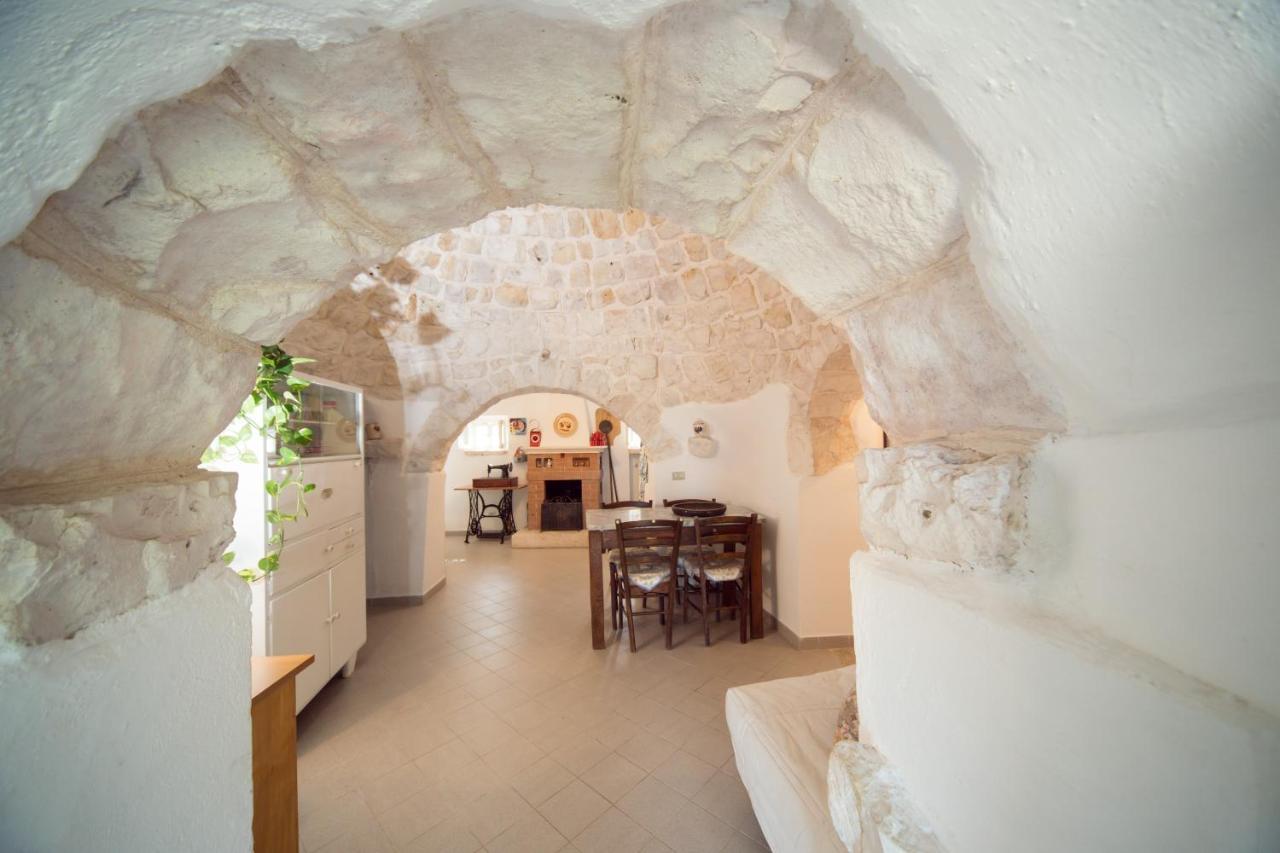 Trulli Girasoli E Viole Cocolicchio Ruang foto
