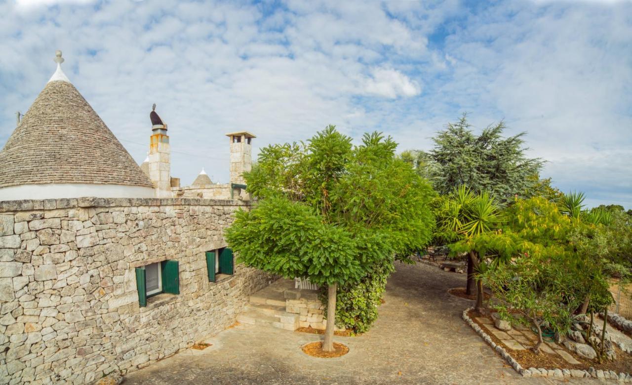 Trulli Girasoli E Viole Cocolicchio Bagian luar foto