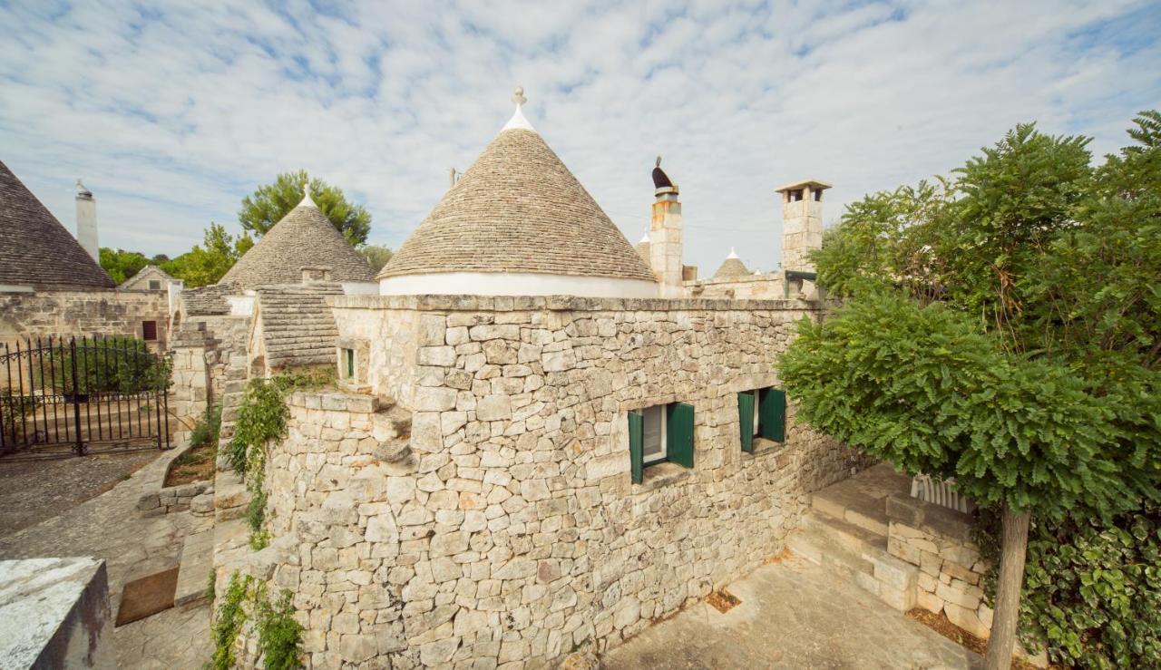 Trulli Girasoli E Viole Cocolicchio Bagian luar foto