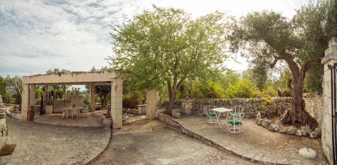Trulli Girasoli E Viole Cocolicchio Bagian luar foto