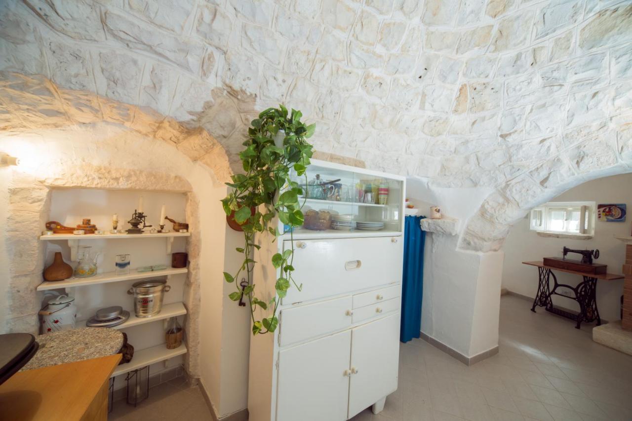 Trulli Girasoli E Viole Cocolicchio Bagian luar foto