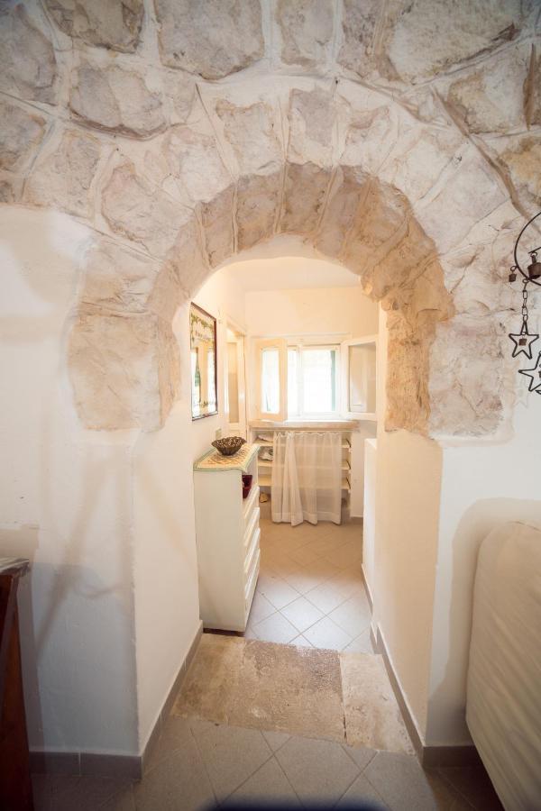 Trulli Girasoli E Viole Cocolicchio Bagian luar foto