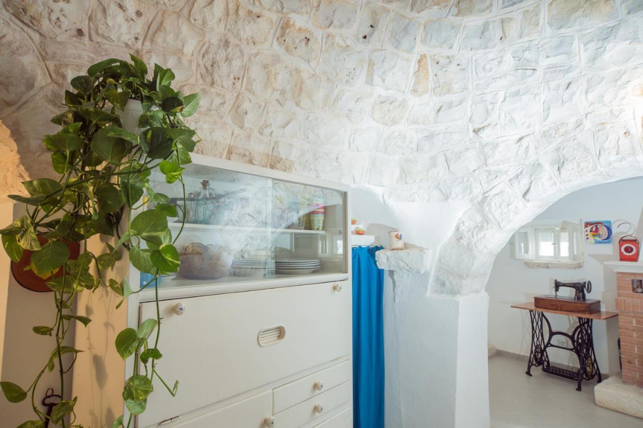Trulli Girasoli E Viole Cocolicchio Bagian luar foto