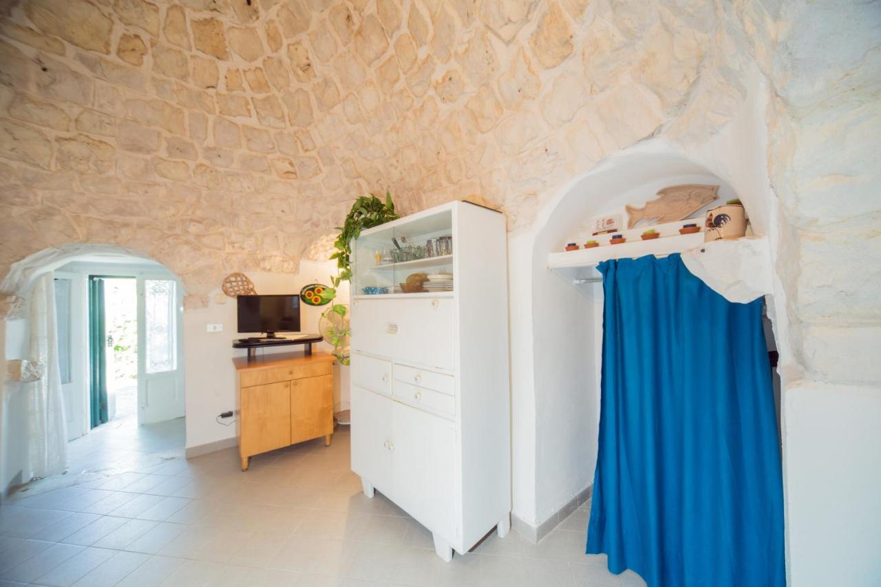 Trulli Girasoli E Viole Cocolicchio Bagian luar foto