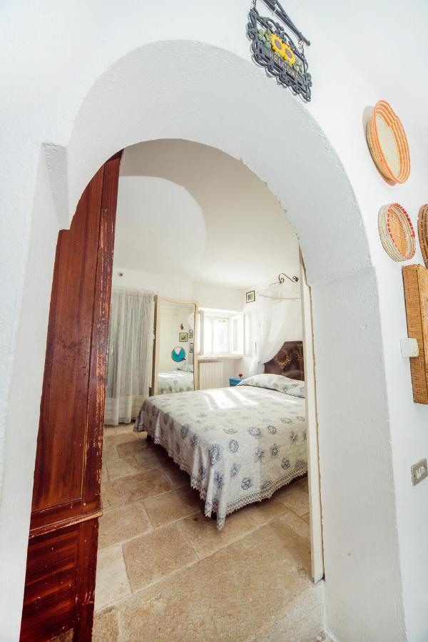 Trulli Girasoli E Viole Cocolicchio Bagian luar foto