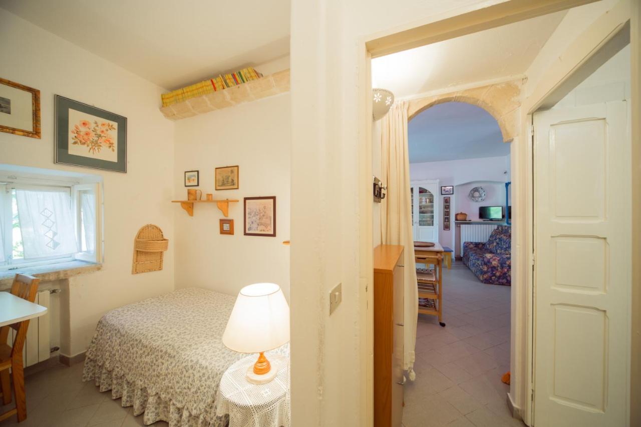 Trulli Girasoli E Viole Cocolicchio Bagian luar foto