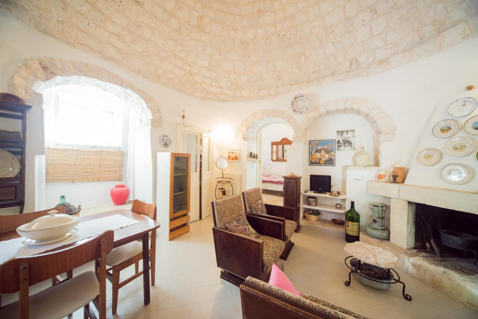 Trulli Girasoli E Viole Cocolicchio Ruang foto
