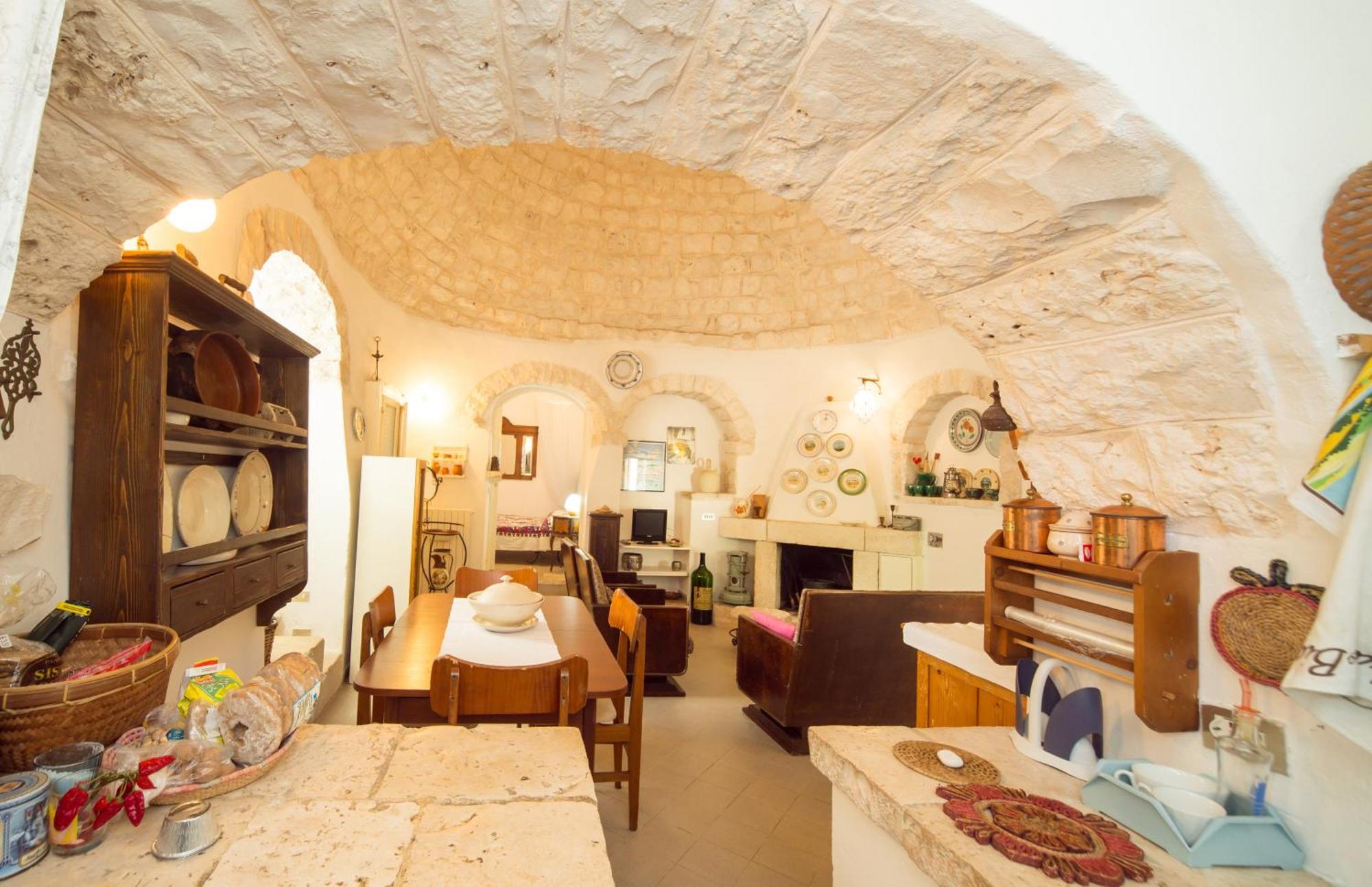 Trulli Girasoli E Viole Cocolicchio Ruang foto